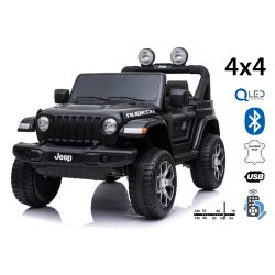 Samochód elektryczny JEEP Wrangler, Jednomiejscowy, czarny, Skórzane siedzenia, Radio z odtwarzaczem Bluetooth, Wejście SD / USB, Napęd 4x4, Akumulator 12V10Ah, Koła EVA, Osie zawieszenia, Pilot 2,4 GHz