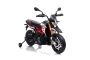Motorek elektryczny APRILIA DORSODURO 900, licencjonowany, akumulator 12V, miękkie koła EVA, silniki 2 x 18W, zawieszenie, metalowa rama, metalowy widelec, koła pomocnicze, czerwony